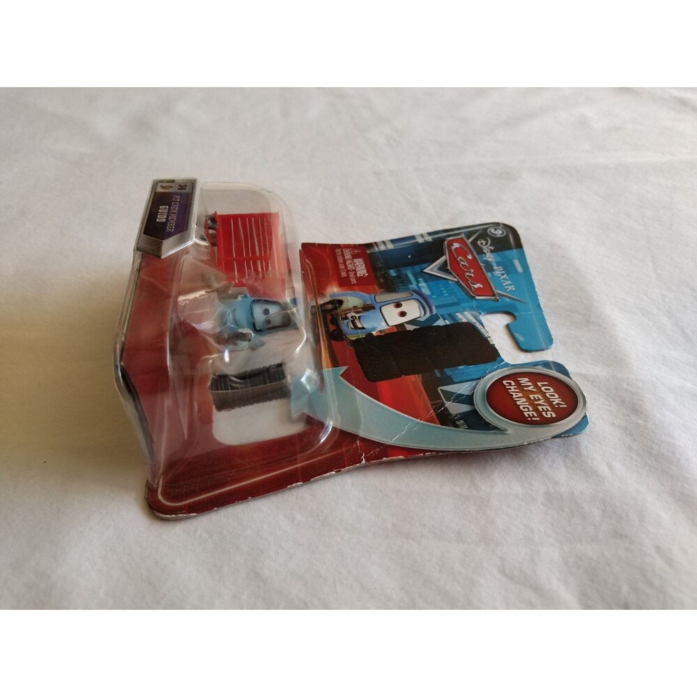 2010 Disney Pixar Cars Skyline Lenticular PIT CREW MEMBER GUIDO #34 New - Picture 9 of 10